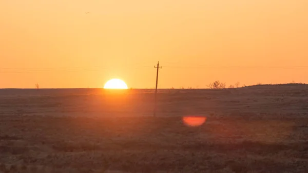 Strommasten bei Sonnenuntergang — Stockfoto