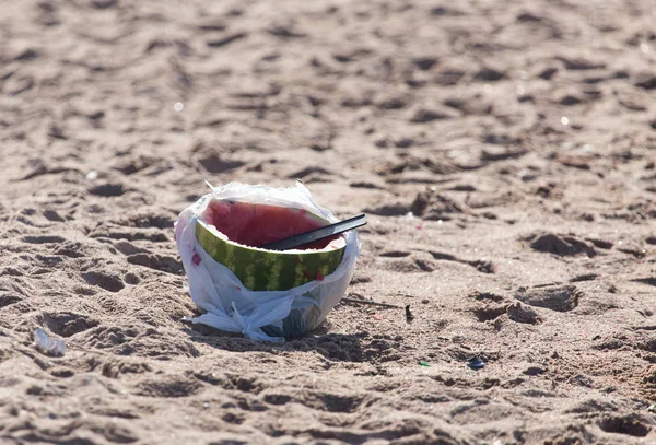 Watermelon on the sand as a litter — Stock Photo, Image