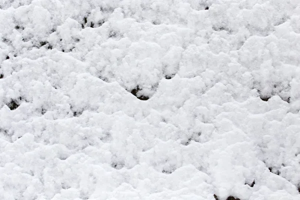 Nieve en la valla de madera como telón de fondo —  Fotos de Stock