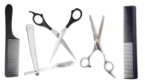 Comb with scissors and razor on a white background — Stock Photo, Image