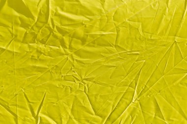 arka plan olarak buruşuk sarı bez