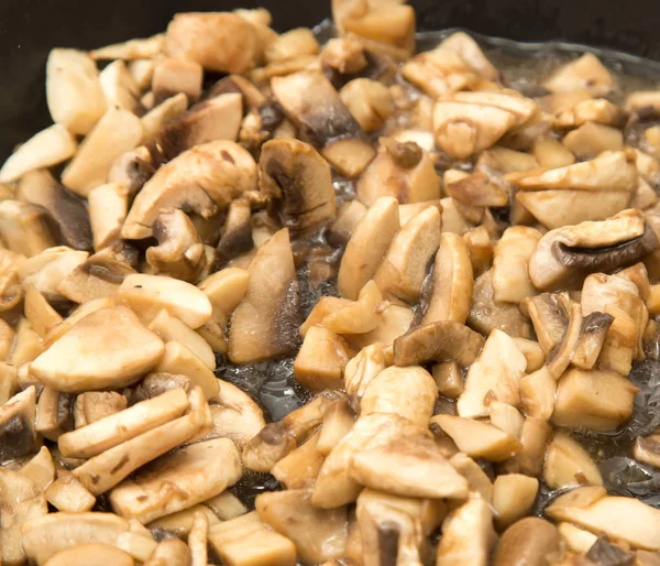 Mushrooms fried in a pan — Stock Photo, Image