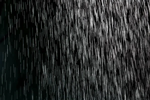 Chuva em um fundo preto — Fotografia de Stock
