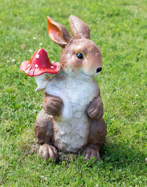Bunny with mushroom in nature — Stock Photo, Image