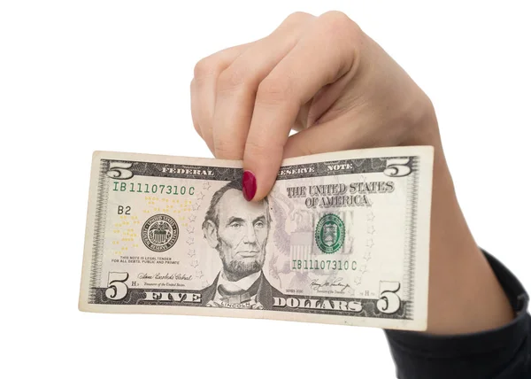 Dollars in the hand of the girl on a white background — Stock Photo, Image