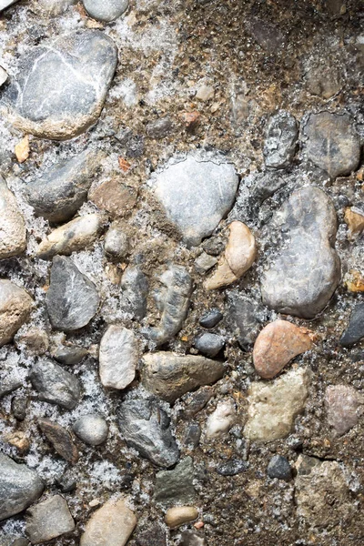 Ijs op de steen op de grond als achtergrond — Stockfoto