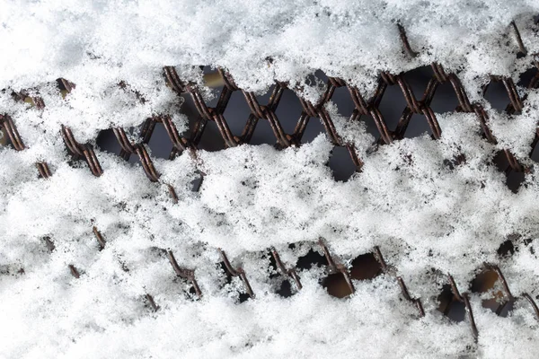 Snö på staketet som bakgrund — Stockfoto