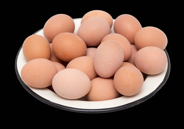 Boiled eggs in a bowl on a black background — Stock Photo, Image