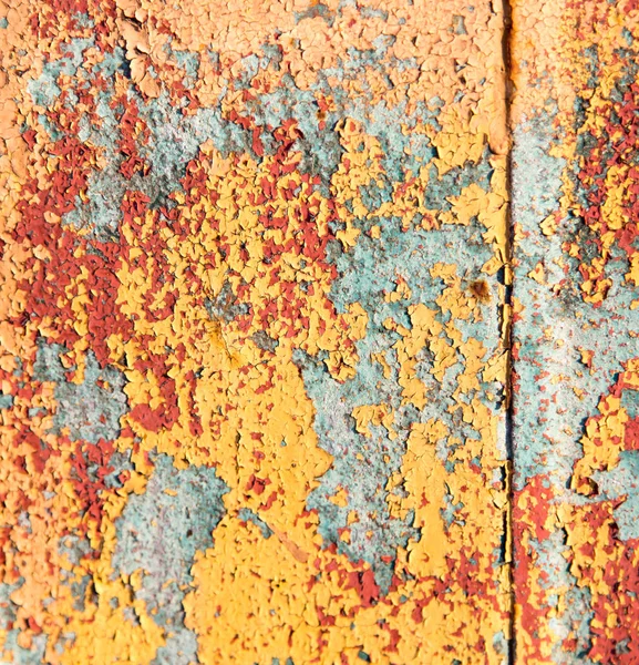 Pintura amarela velha na cerca como pano de fundo — Fotografia de Stock