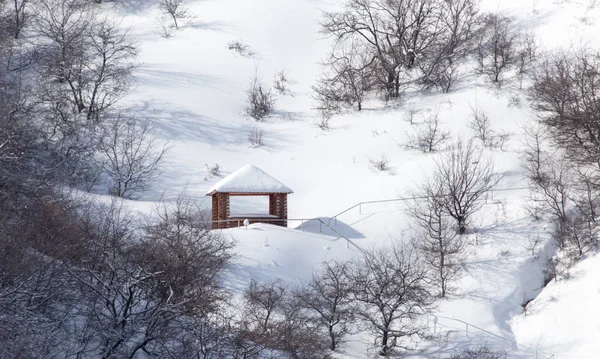 A gazebo in the snow in the winter — Stock Photo, Image