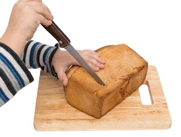 Hands on bread on a board on a white background — Stock Photo, Image