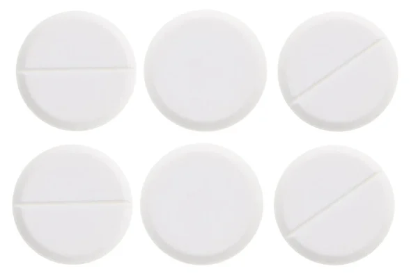 Медицинские таблетки на белом фоне — стоковое фото