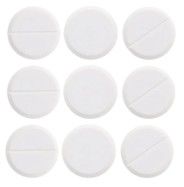 Pílulas médicas em fundo branco — Fotografia de Stock