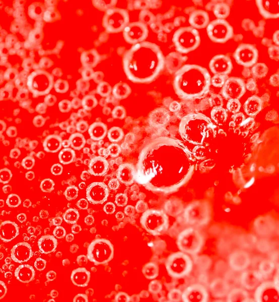 Gotas Miel Sobre Fondo Rojo Foto Una Textura Abstracta —  Fotos de Stock