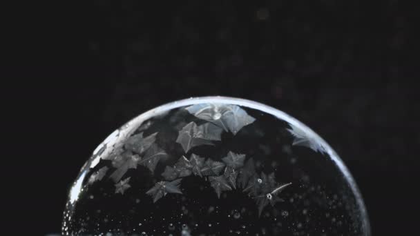 Frozen bubble, winter holidays background, — Stock Video
