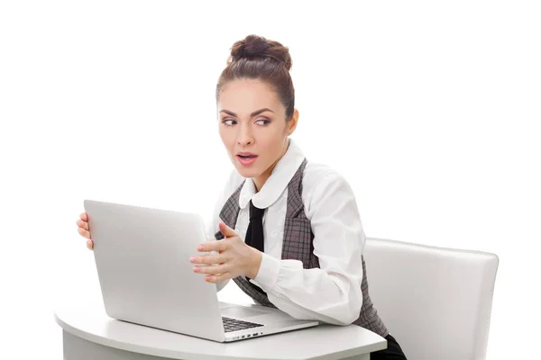 Woman hiding what she doing on laptop — Stock Photo, Image