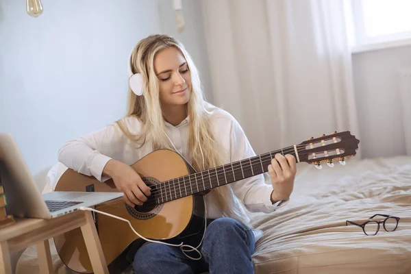 stock image Gir Learning to Play Guitar at Home