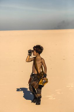 Post Apocalyptic Warrior Boy Outdoors in Desert Wasteland