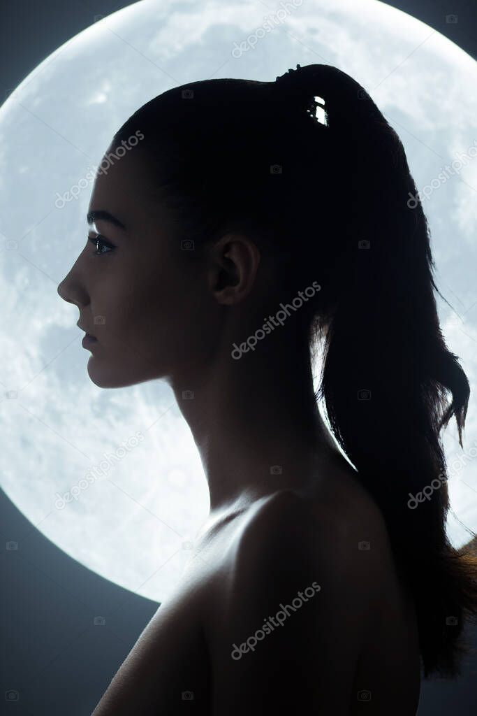 Fine Art Fashion Studio Portrait of Woman at Full Moon