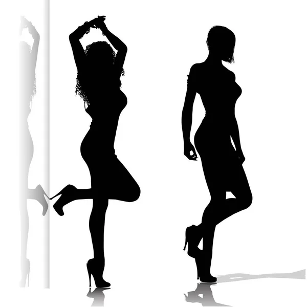 Staande vrouwen silhouetten — Stockvector