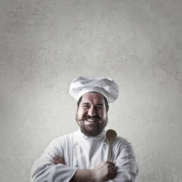 Cook with kitchen spoon — Stock Photo, Image