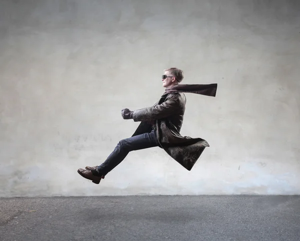 Man driving an imaginary motorbike — Stock Photo, Image