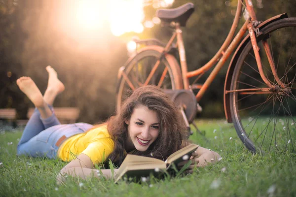 Reading in the nature Stock Image