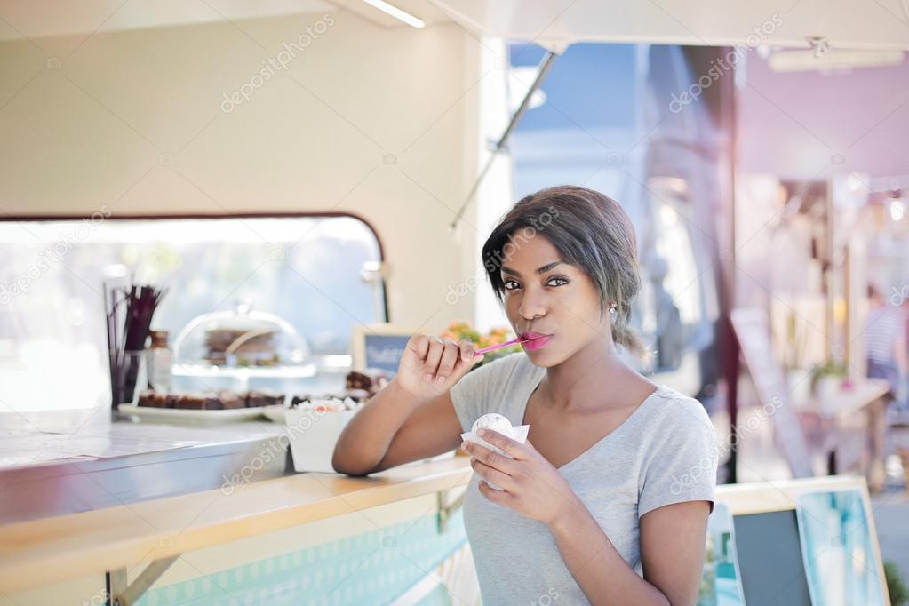 black woman eating ice-cream