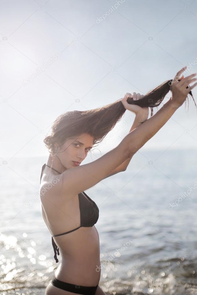 long haired woman on the beach