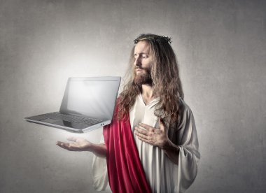İsa ile bir dizüstü bilgisayar