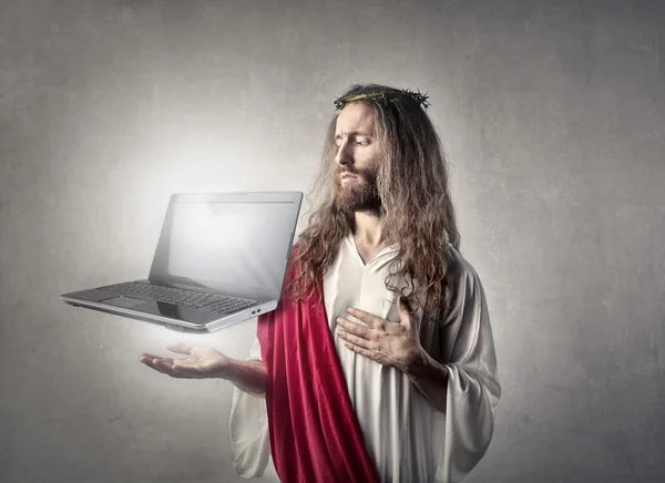 Jesús con un portátil — Foto de Stock