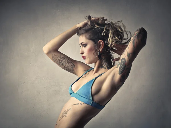 Tattoed woman in lingerie — Stock Photo, Image