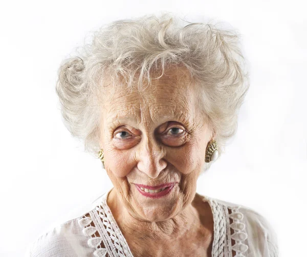 Oude, lachende vrouw — Stockfoto