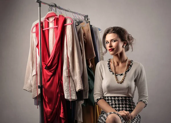 Stylist and her clothes — Stock Photo, Image