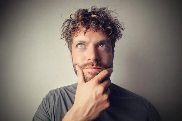 Young man thinking — Stock Photo, Image