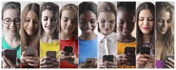 Mulher com telefones — Fotografia de Stock