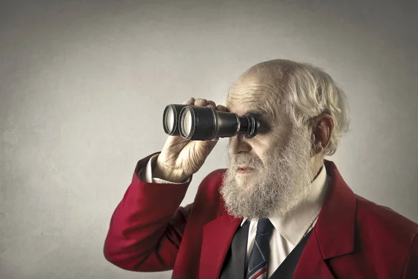Anciano con telescopio —  Fotos de Stock