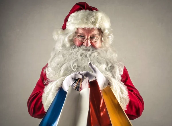 Santa met presenteert — Stockfoto