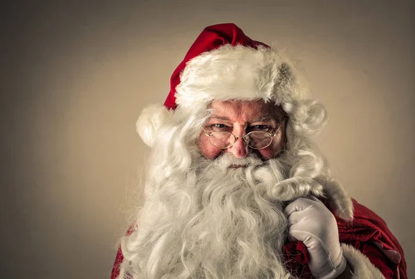Santa maken tevreden gezicht — Stockfoto