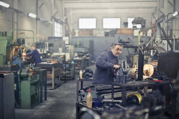 Older man on steel — Stock Photo, Image