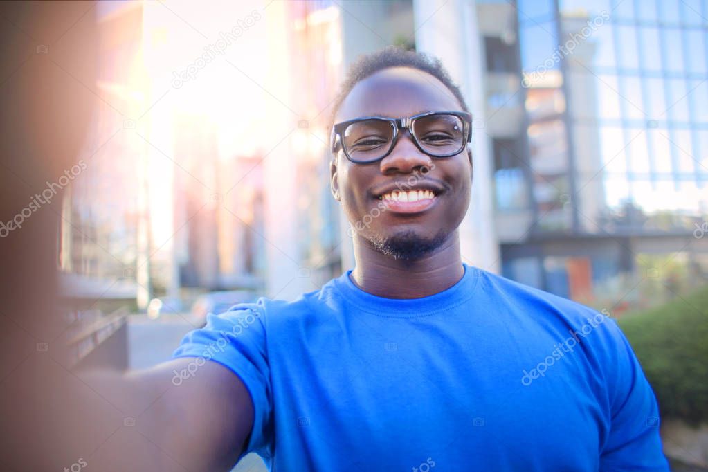 Black guy taking a selfie