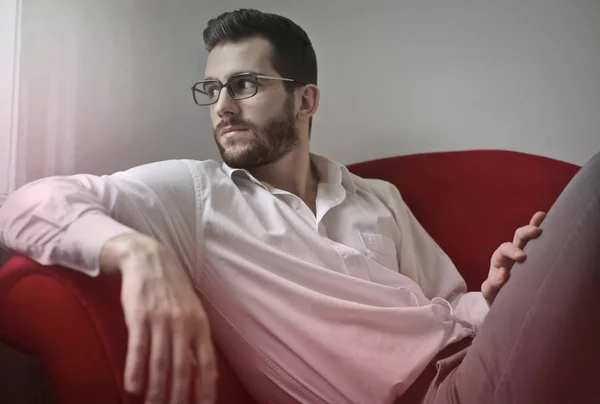 Businessman on sofa — Stock Photo, Image