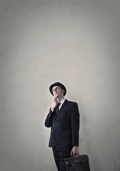 帽子の思考のビジネスマン — ストック写真