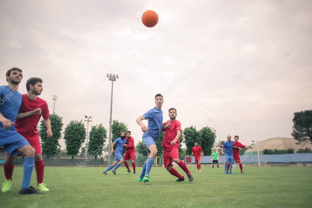 Football players playing on the field