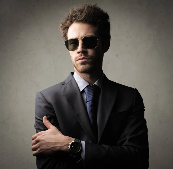 Homem de negócios em óculos de sol — Fotografia de Stock