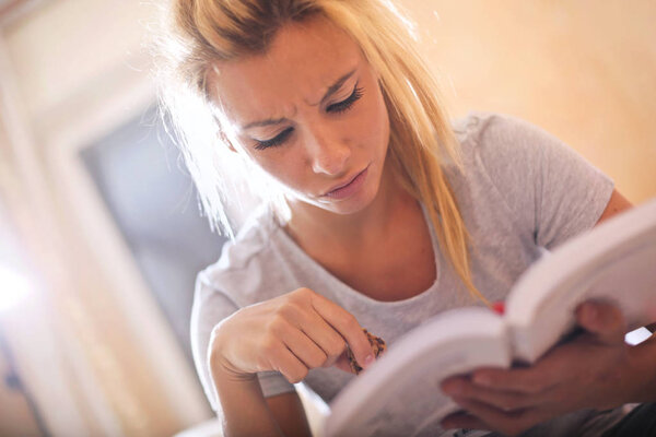 Blond woman reading