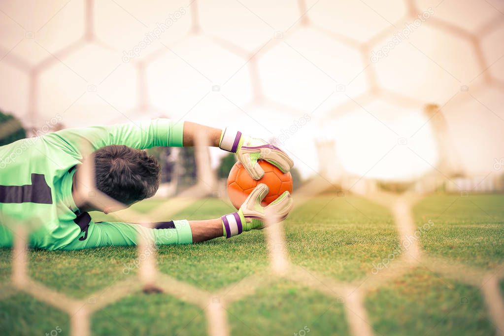 Goal keeper catching the ball outside
