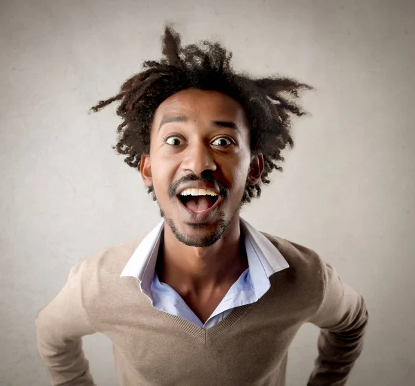 Young black man being very excited — Stock Photo, Image