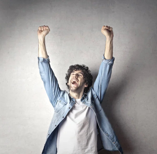 Young man feeling successful inside — Stock Photo, Image
