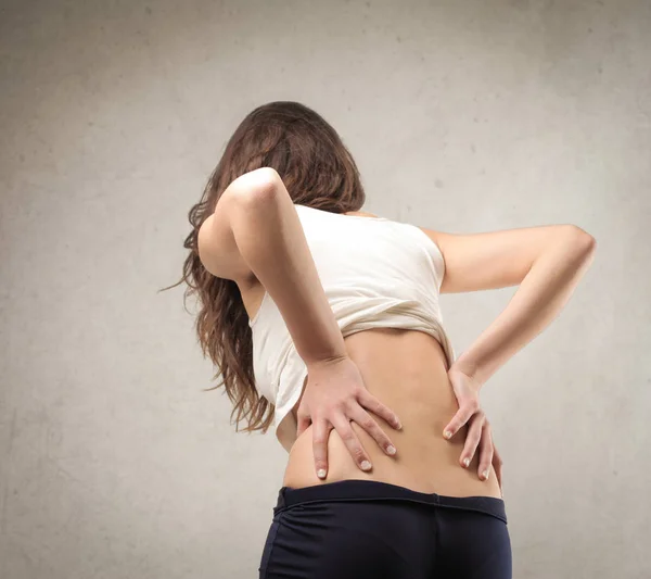 Woman with back pain — Stock Photo, Image